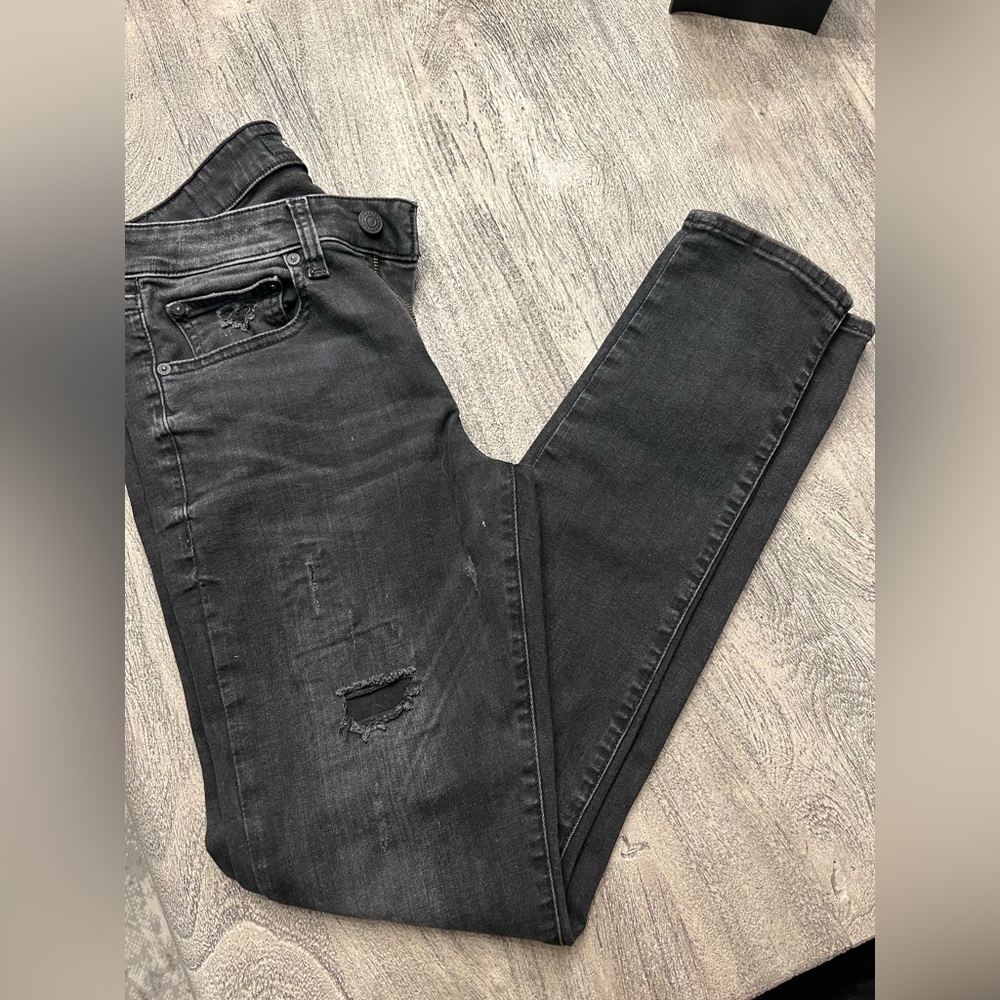 Express men’s skinny denim size 31/34. Distressed areas dark gray/black